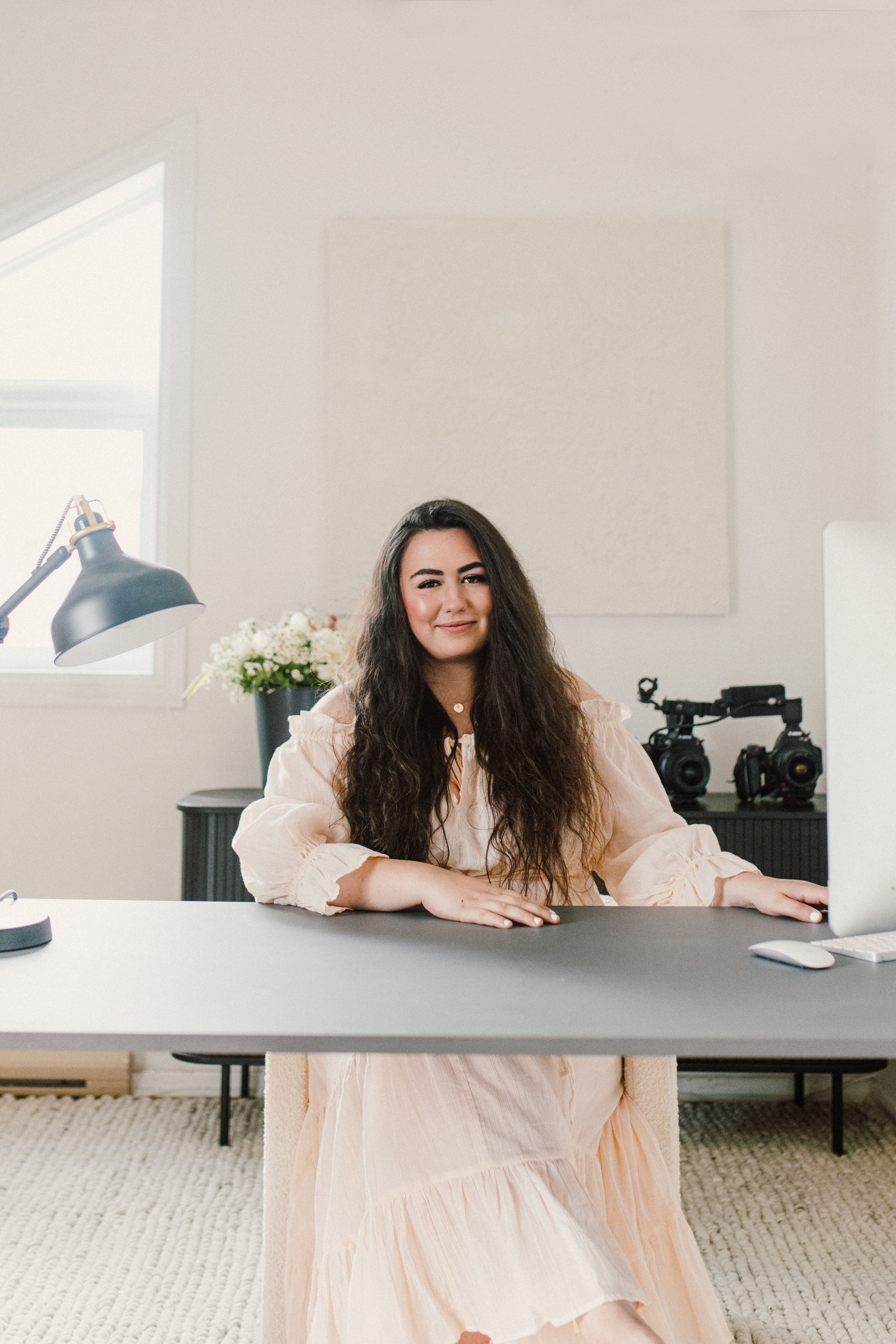 Natasha Cloutier, founder of Main Stage Content, at her studio desk.